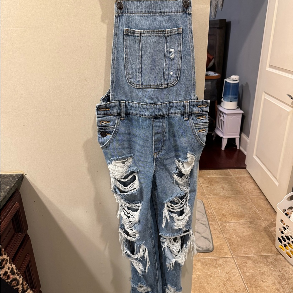 Light Blue Distressed Denim Jumpsuit with Adjustable Straps